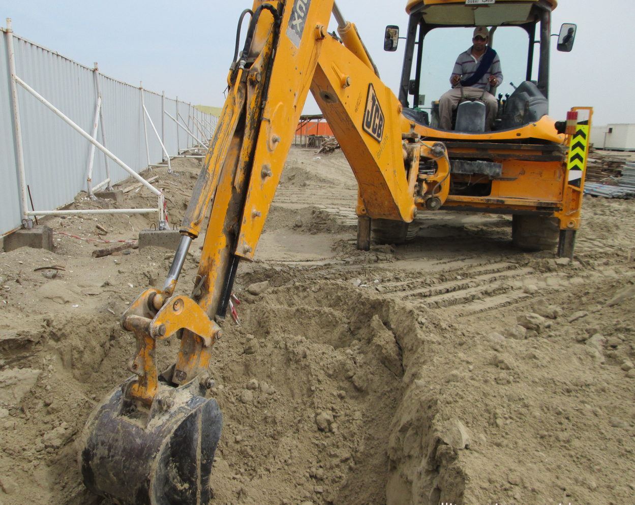 Liberty Development Corporation using an excavator on a job site